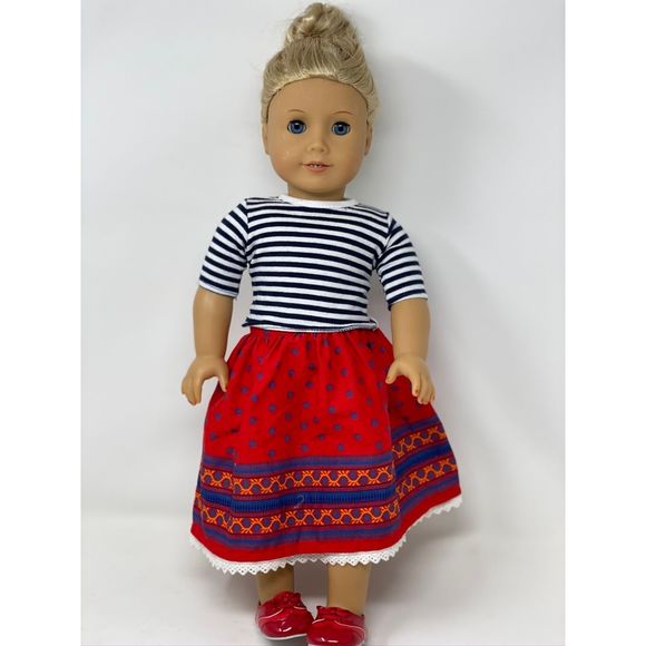 american girl doll with blonde hair and blue eyes